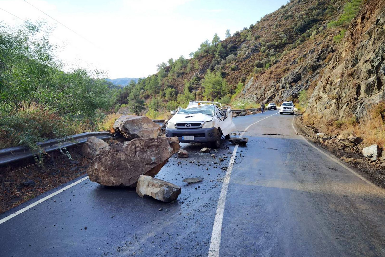 image Double cab hit by rockslide, driver unhurt