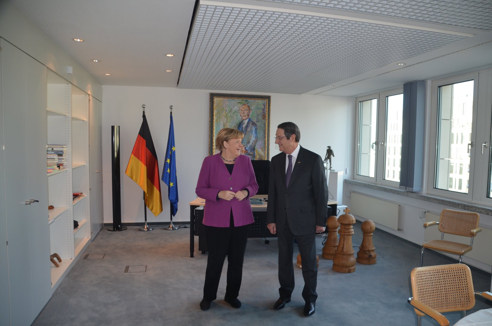 image Anastasiades meets Germany&#8217;s former Chancellor Merkel