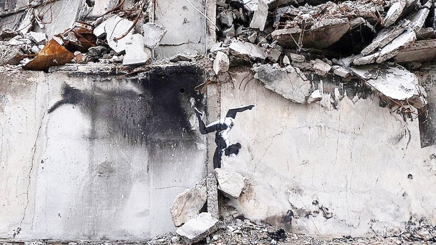 image Banksy showcases new mural in war-scarred Ukrainian town