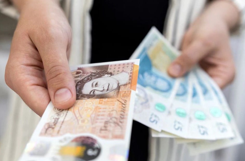 cover Cash use slips to just 15 per cent of British purchases in 2021