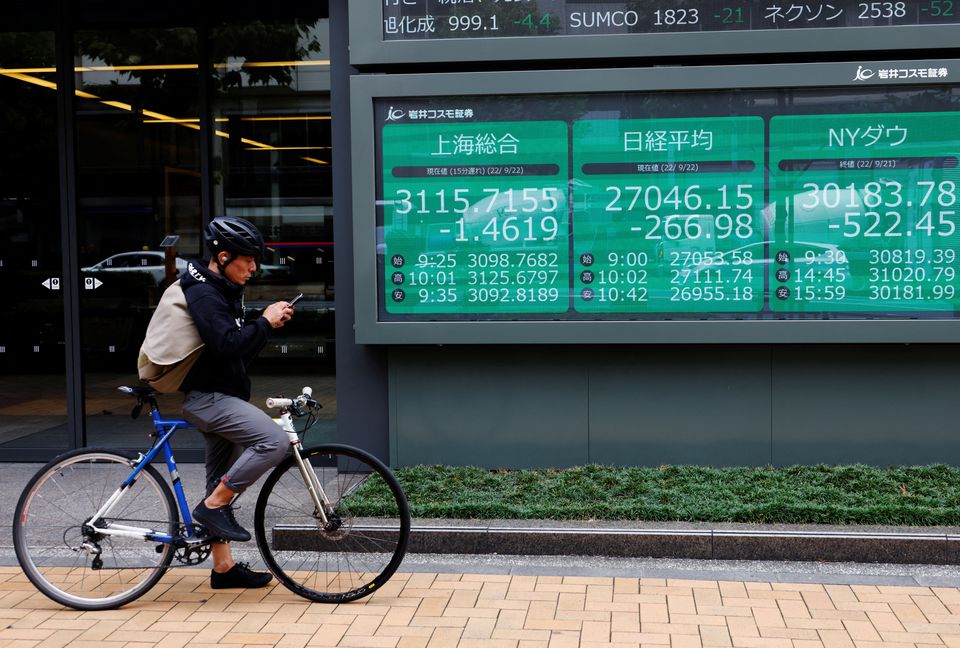 image Stocks advance, US dollar retreats as China drops quarantine rule
