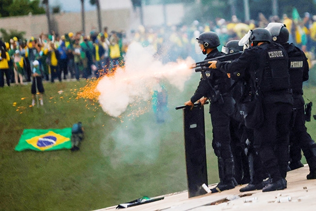 image Brazil riot police deploy at Bolsonaro backers&#8217; camp after capital stormed