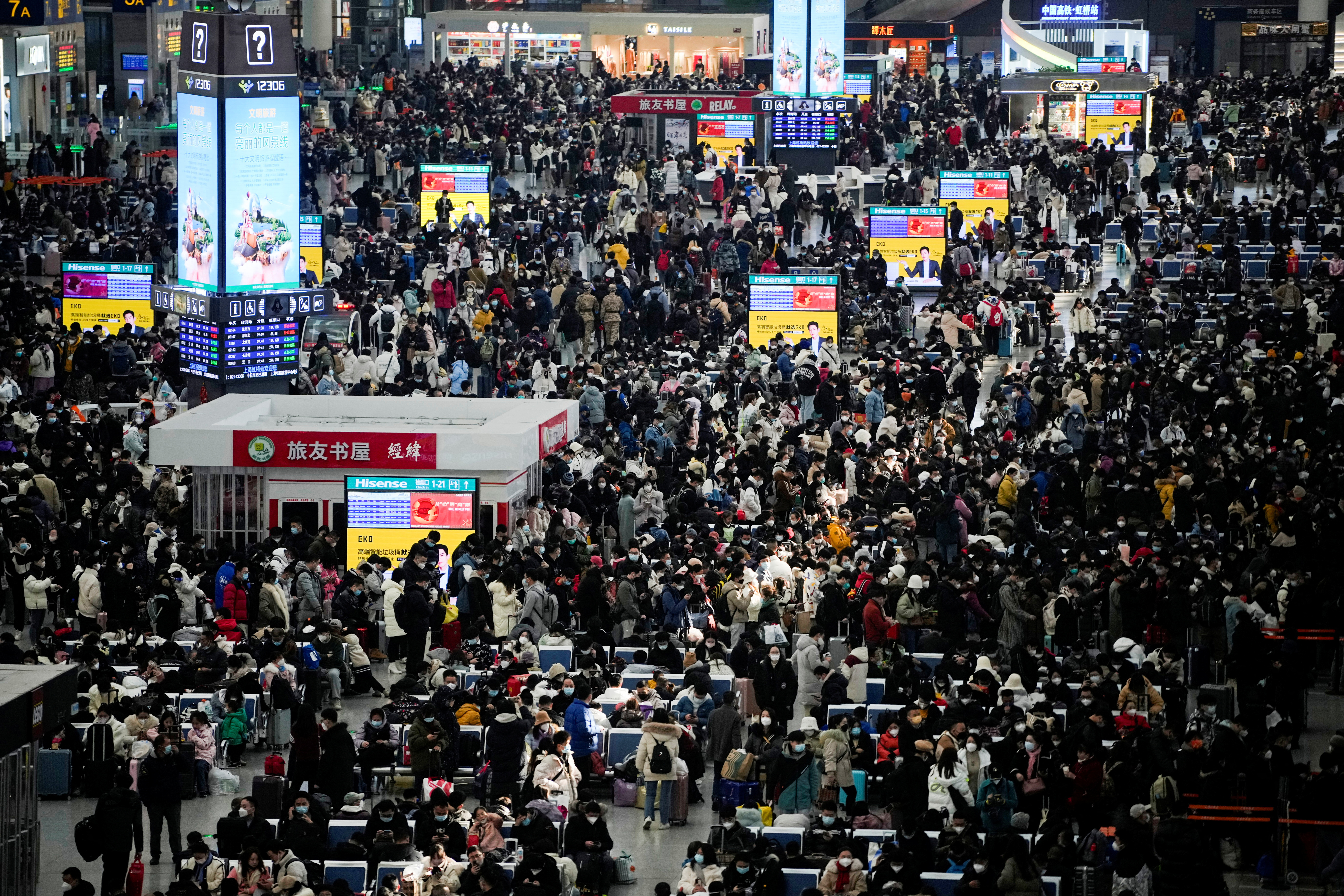 image Millions of Chinese workers on the move ahead of Friday travel peak