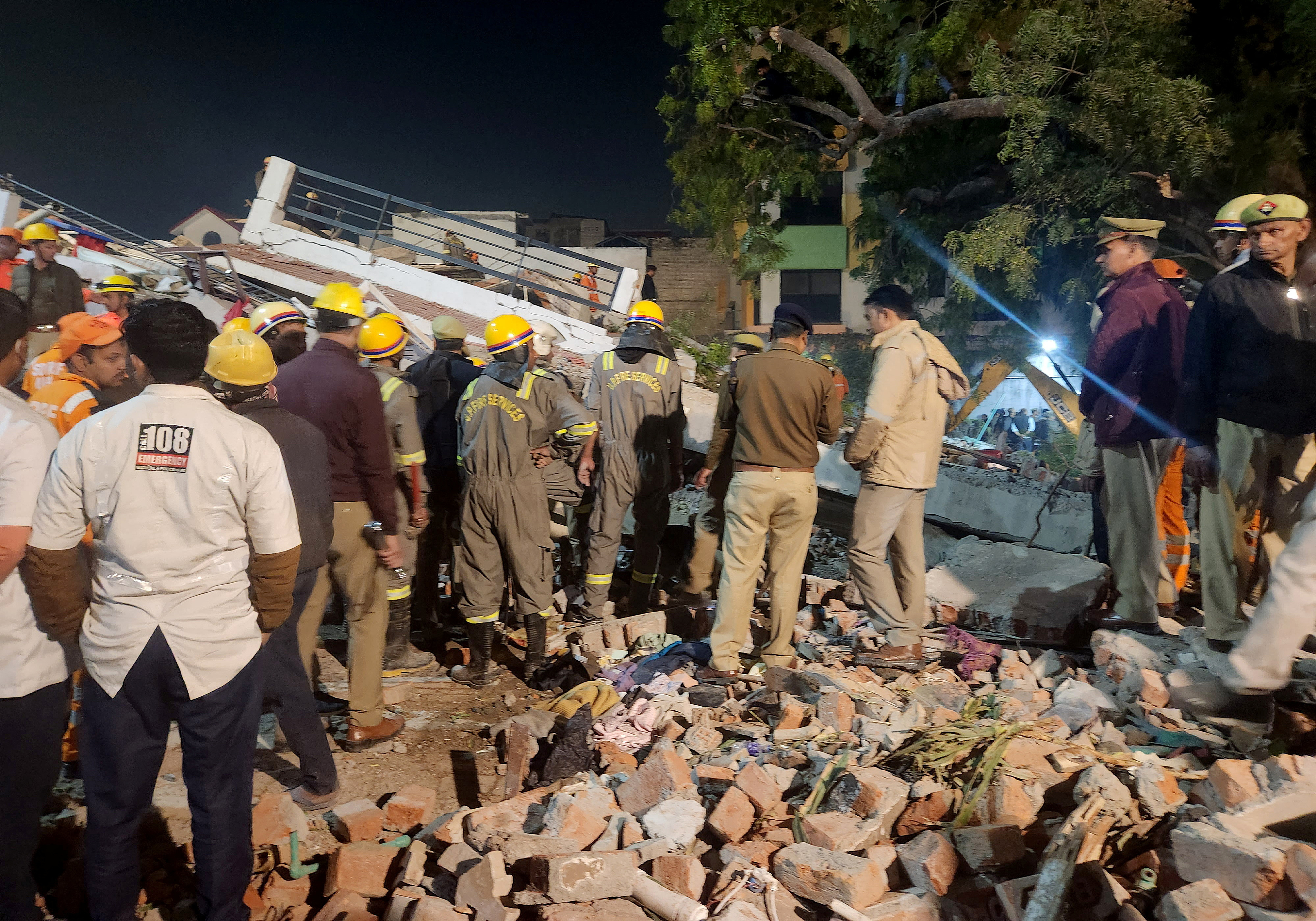 image Twelve rescued after building collapses in India; more feared trapped