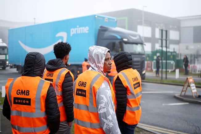 image Amazon workers walk out over pay in first UK strike