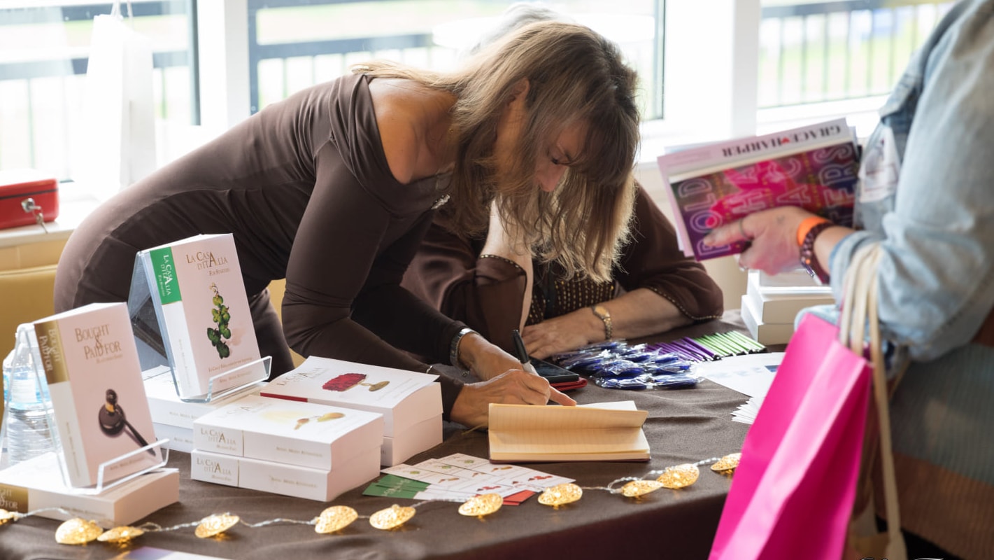 signing a book