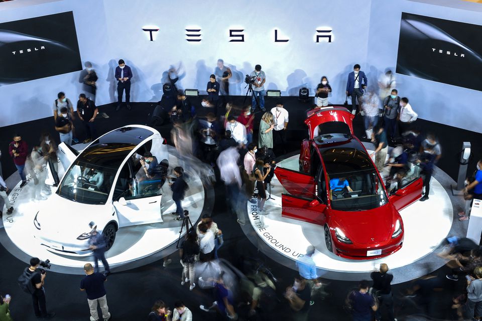 image Tesla shares start 2023 lower on worries over weak demand, logistical issues