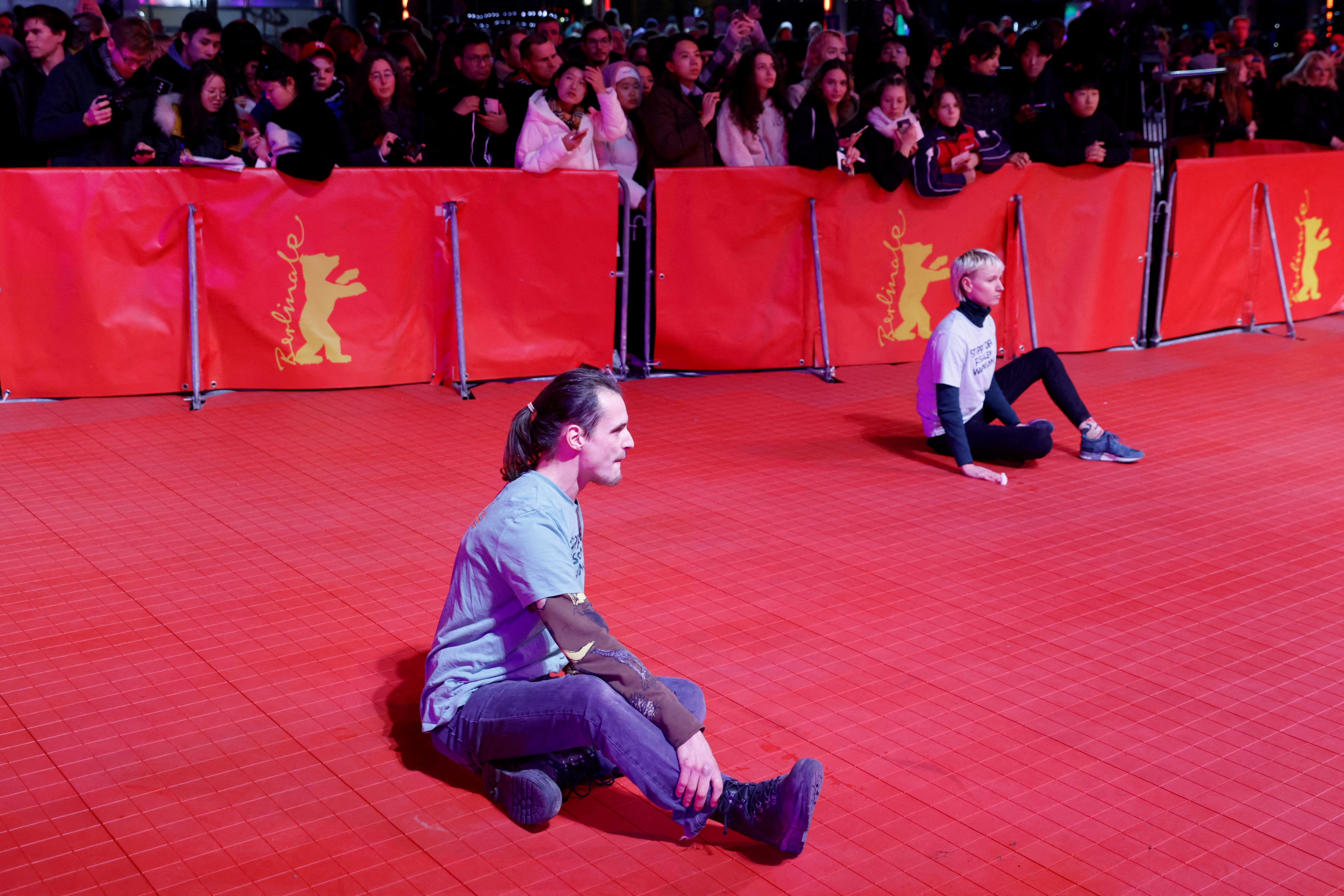 image Climate activists glue themselves to Berlinale&#8217;s red carpet