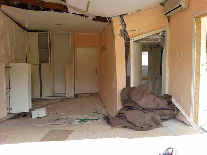 cover Over ten years on, still no compensation for crumbling Pissouri homes