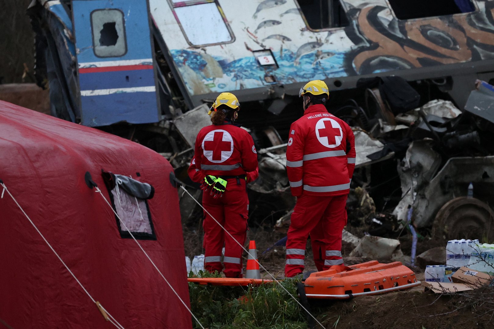 image Greek rescuers comb through train crash wreckage