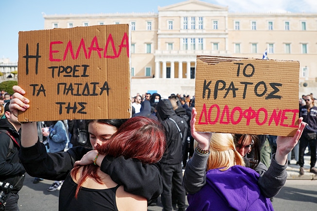 image Tens of thousands march in Greece in angry train crash protest