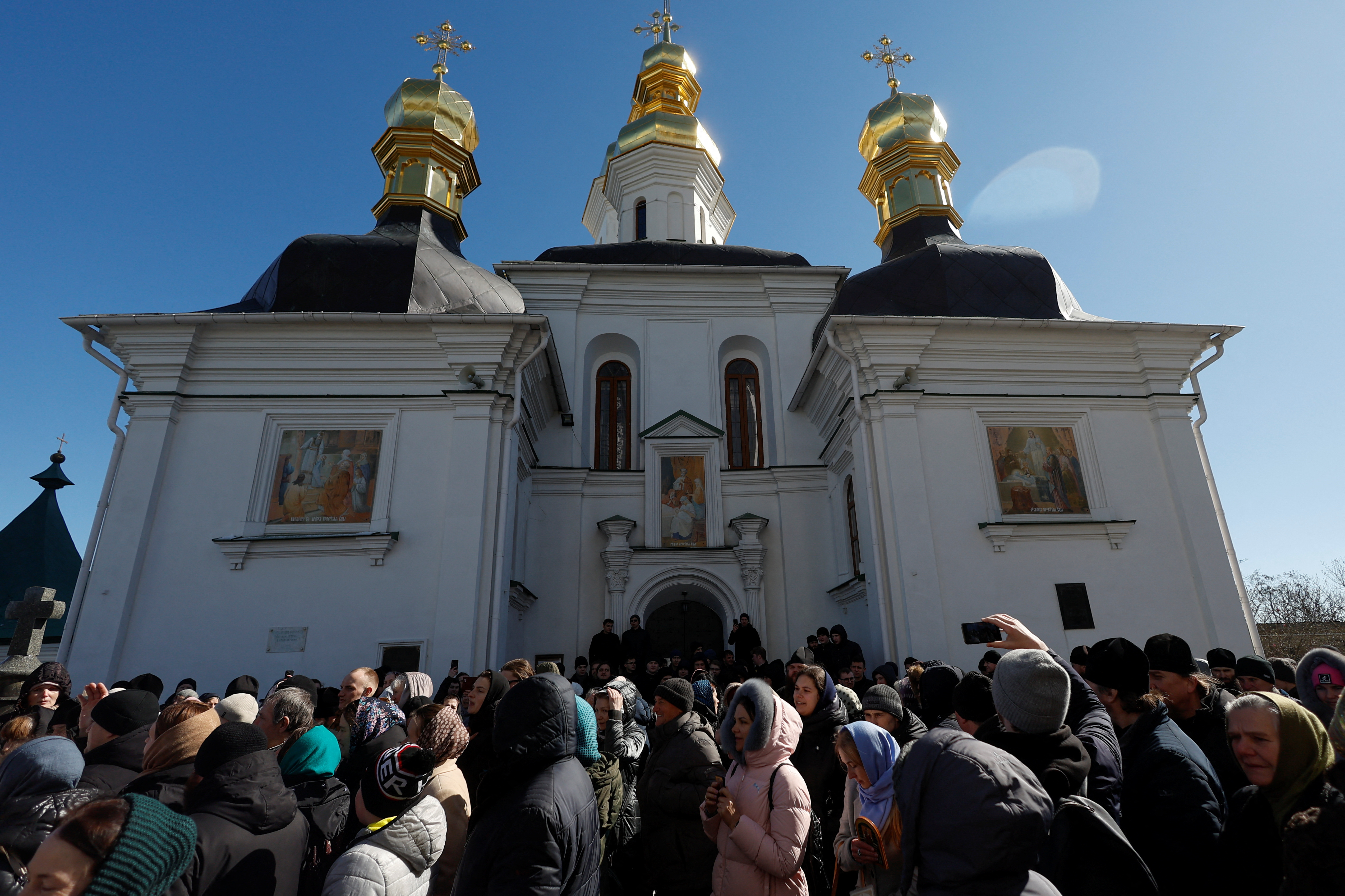 image Scuffles at Kyiv monastery as Church accused of Russia ties resists eviction
