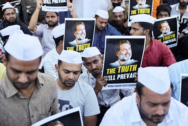 image Indian opposition dealt blow as parliament bars Congress leader Gandhi
