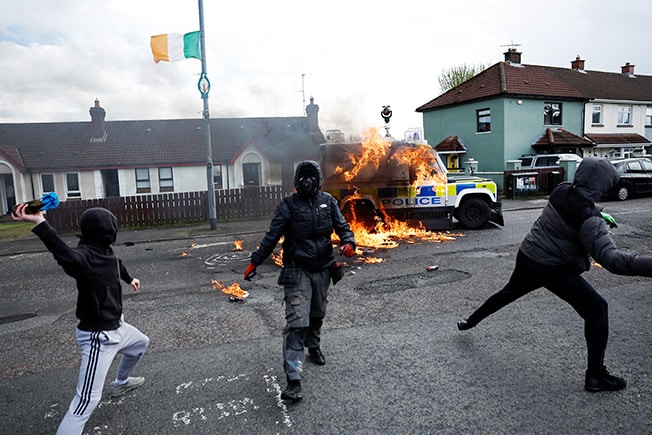 cover Petrol bombs thrown at Northern Irish police on eve of Biden visit
