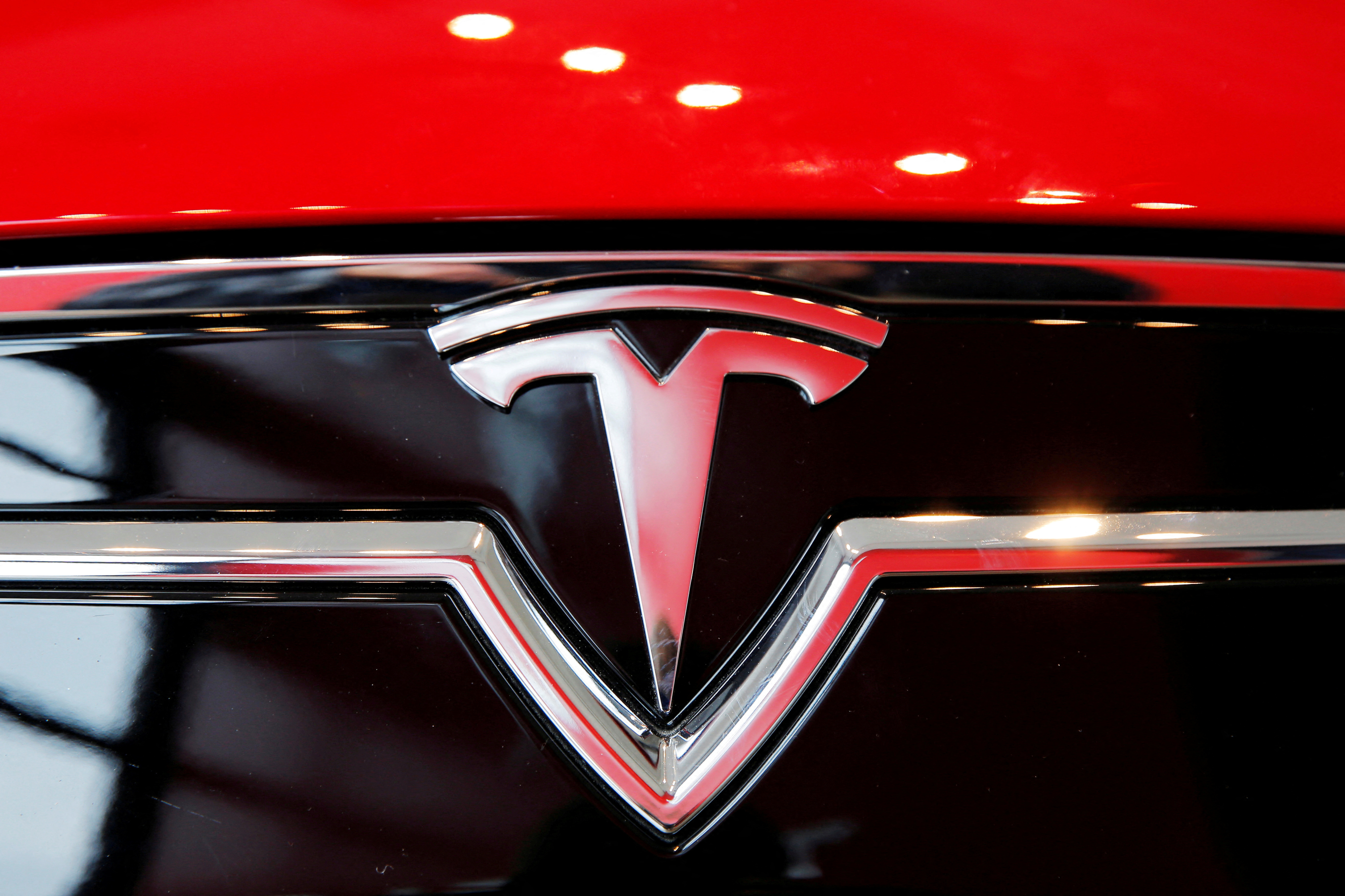 cover Tesla&#8217;s searing rally elicits downgrades, caution on Wall Street