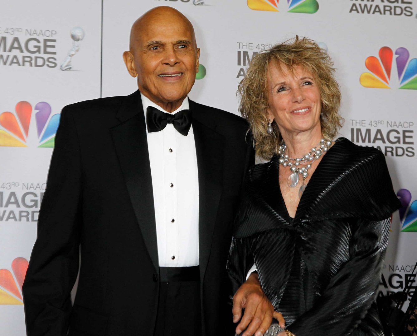 file photo: actor and singer harry belafonte and wife pamela arrive at the 43rd naacp image awards in los angeles