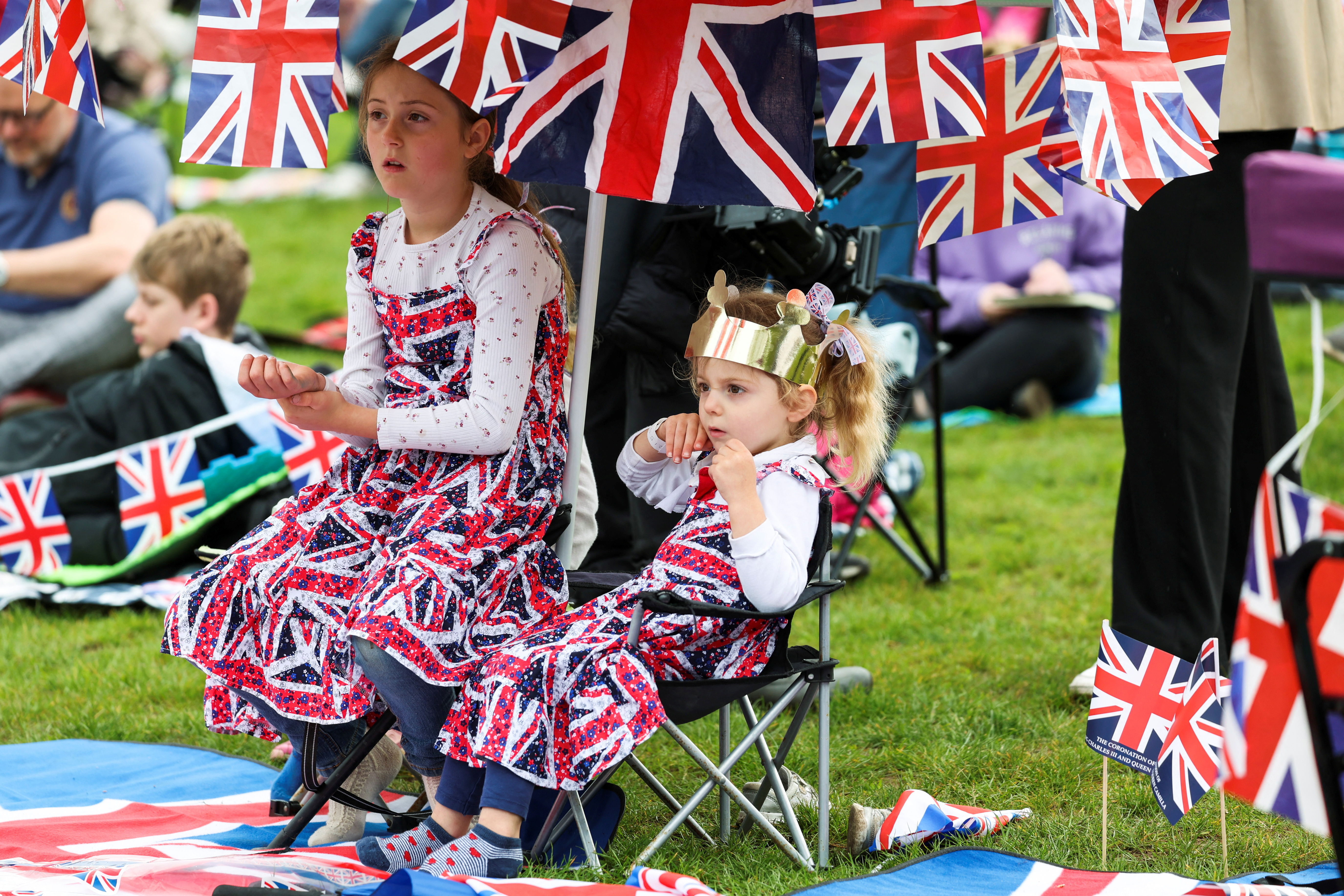 image Coronation draws tens of thousands in paper crowns and plastic tiaras