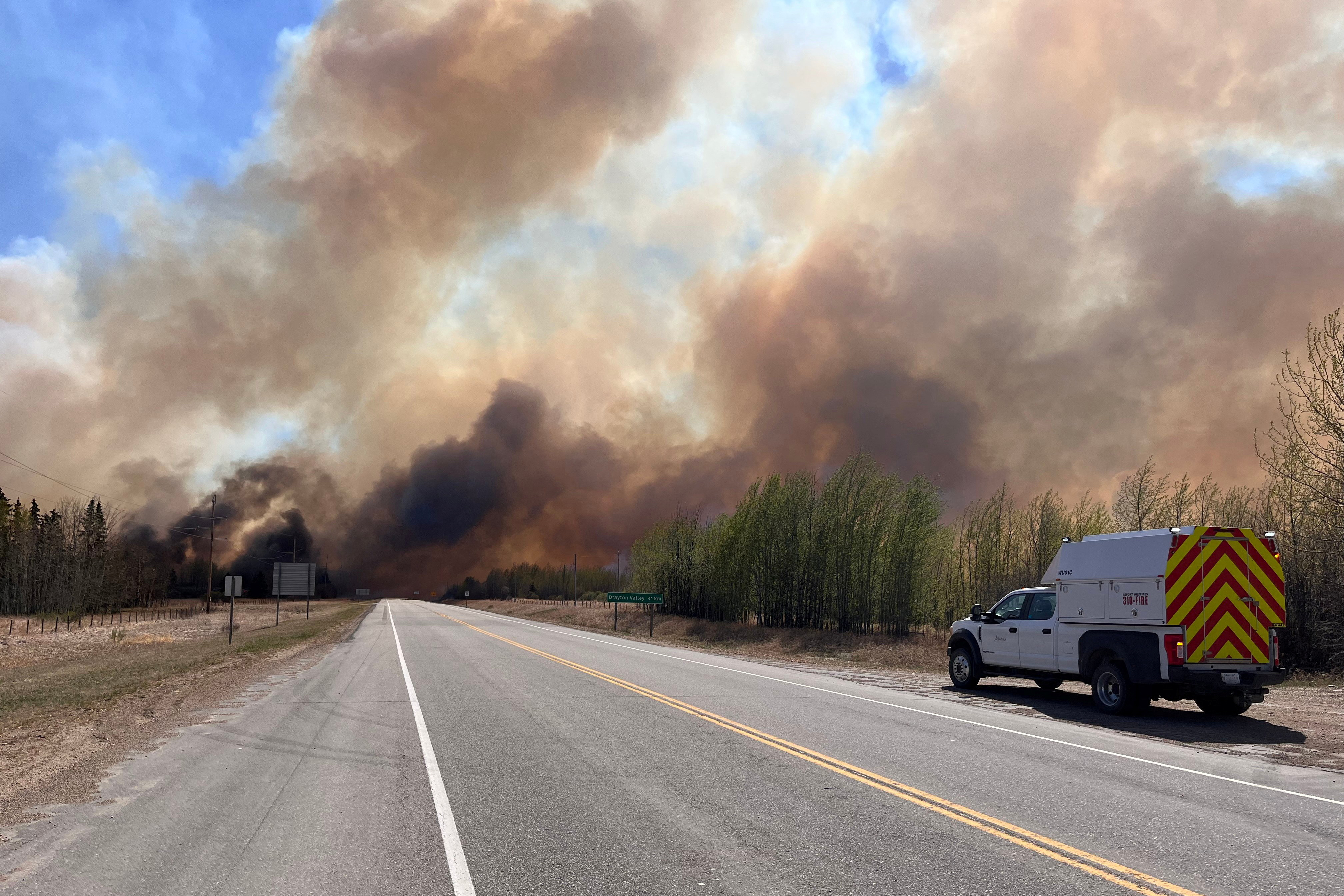 image Alberta wildfires force oil production shutdowns, even as cooler weather sets in