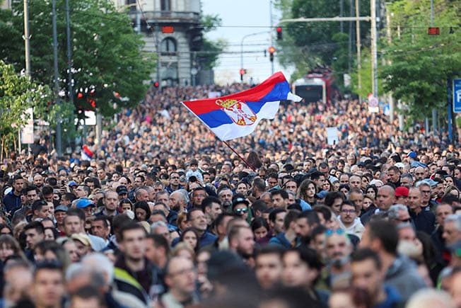image Serbians rally against violence after two mass shootings