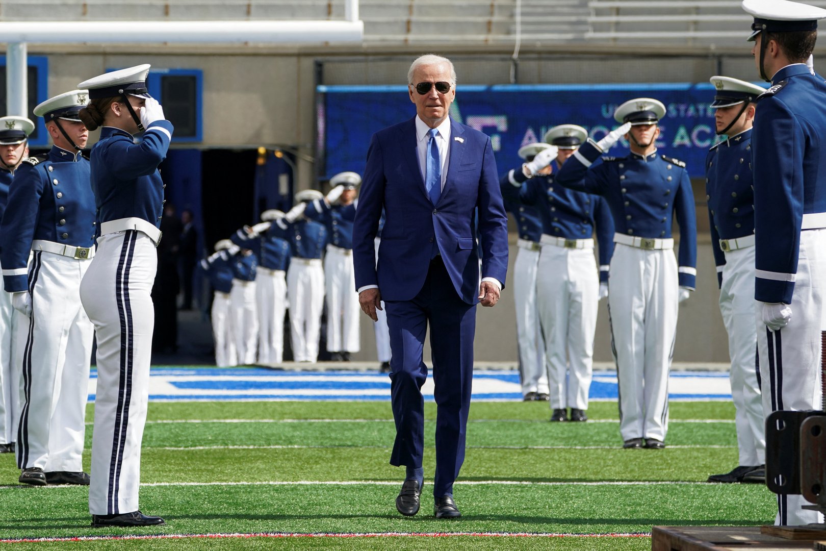 image Biden trips and falls during graduation ceremony, recovers quickly (video)