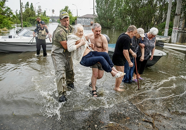 image Zelenskiy visits flood-stricken areas to assess scale of disaster