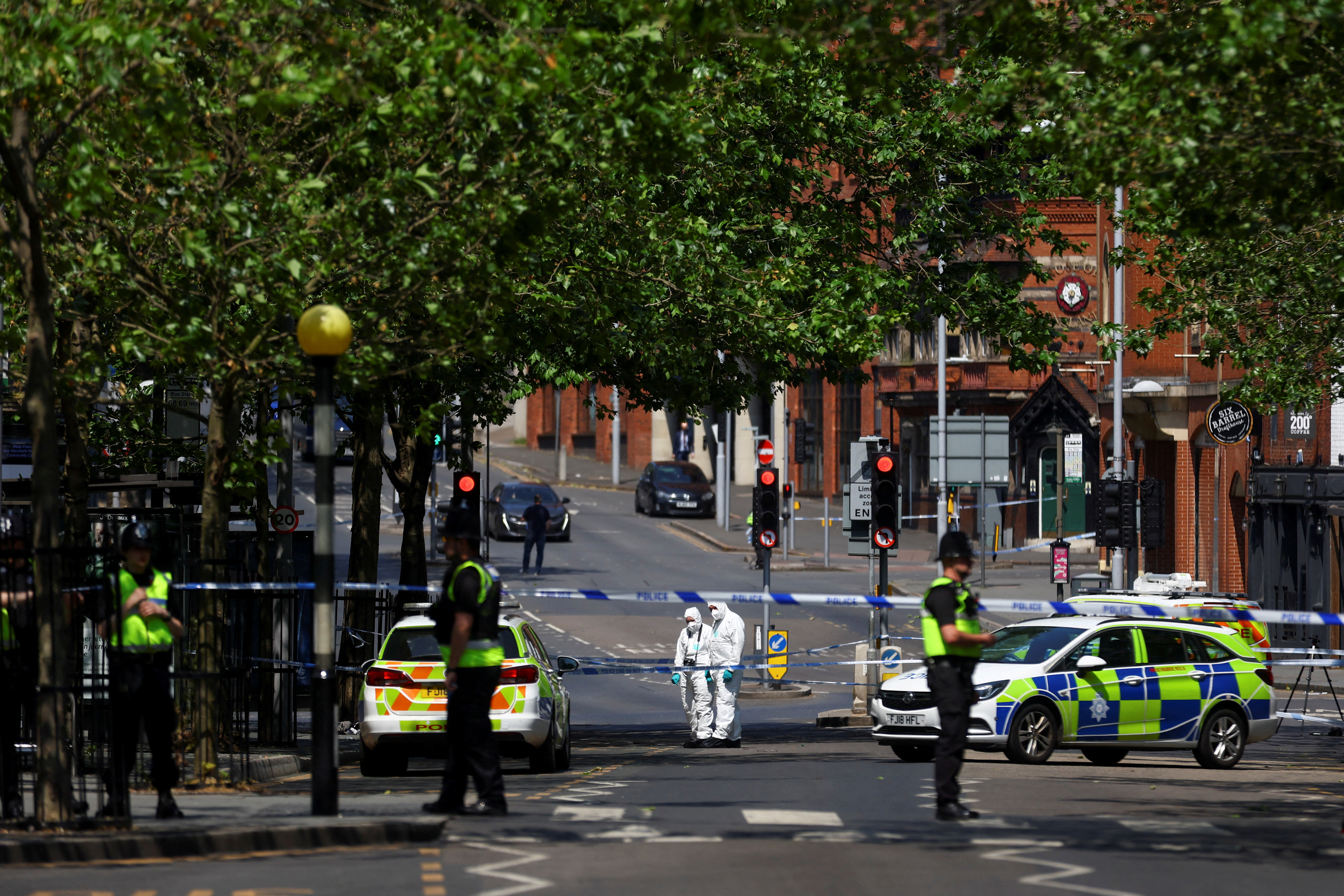 image UK police seek motive for Nottingham murders