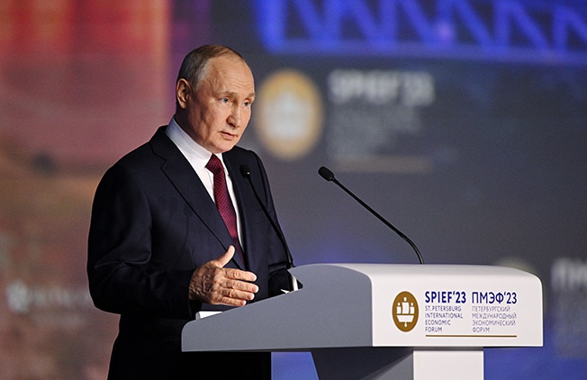 image Putin extols Russian economic performance, defends military spending