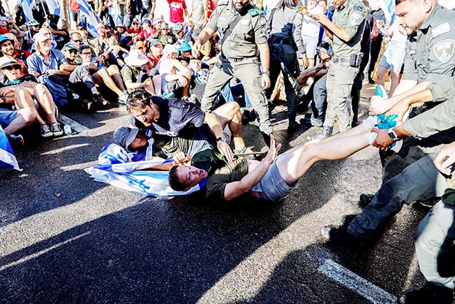 image Protests rage as Israel passes contested curbs on some Supreme Court powers (Update)