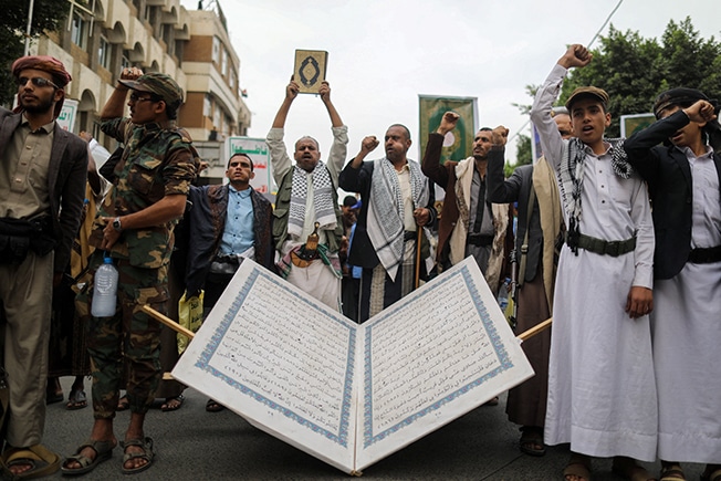 image Korans burnt in front of Egyptian, Turkish embassies in Denmark