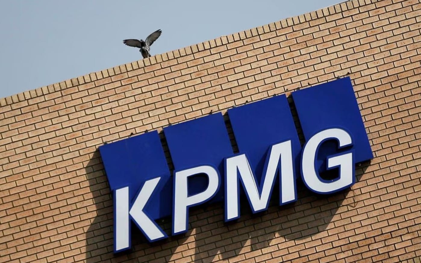 cover KPMG to invest $2 billion in AI, cloud services