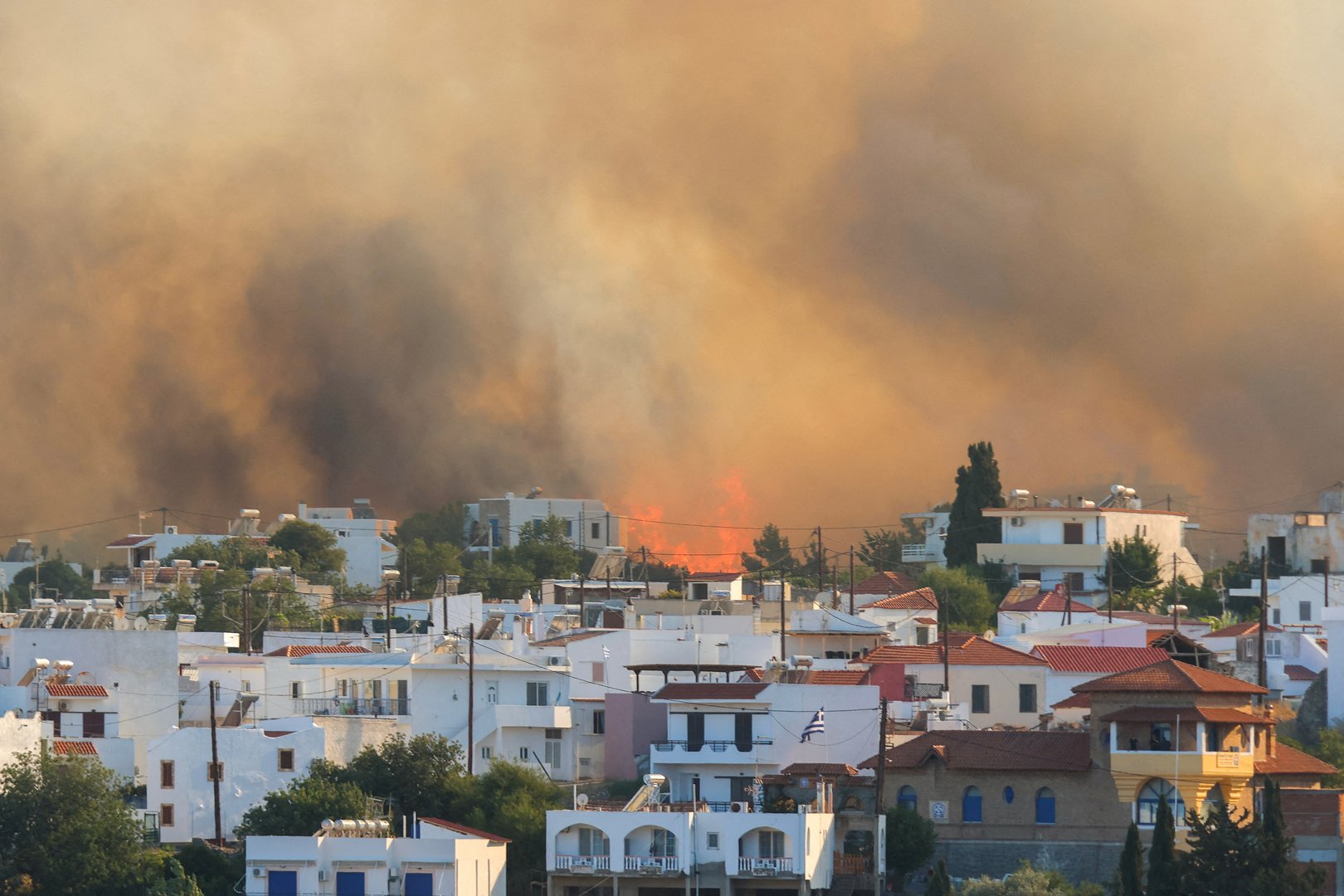 image Greece sees some wildfire respite, though stubborn blazes rage on