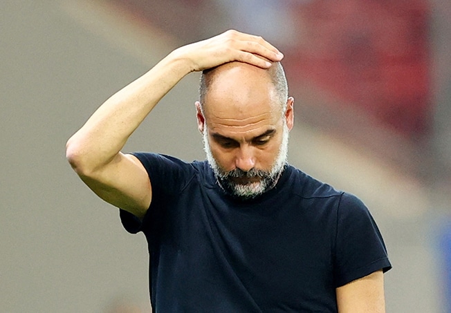 image Guardiola to miss City&#8217;s next two games after surgery