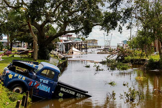 cover Avoiding catastrophe, Florida&#8217;s Gulf Coast begins cleanup from Hurricane Idalia