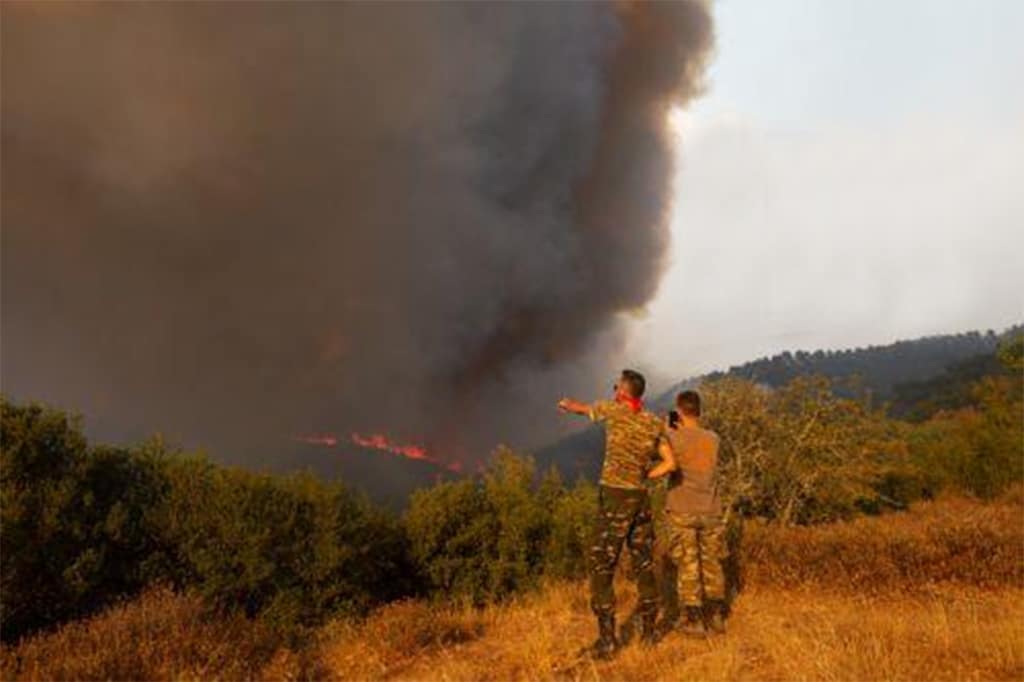 cover Cyprus firefighting team in Greece moves to new front