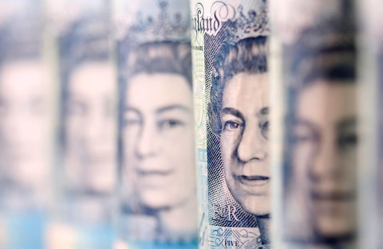 cover Pound steady day after election announcement, inflation data