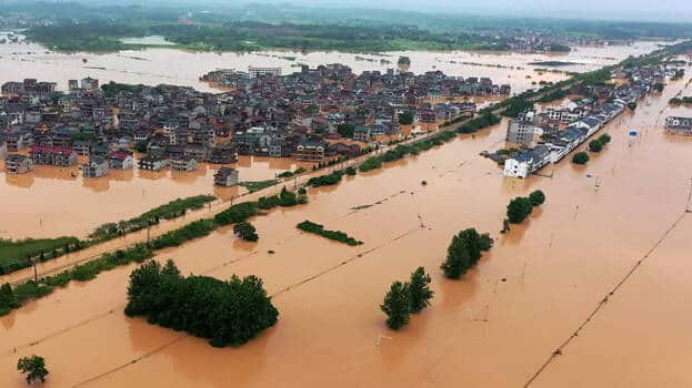 image Floods, mudslides kill two in northwestern China city