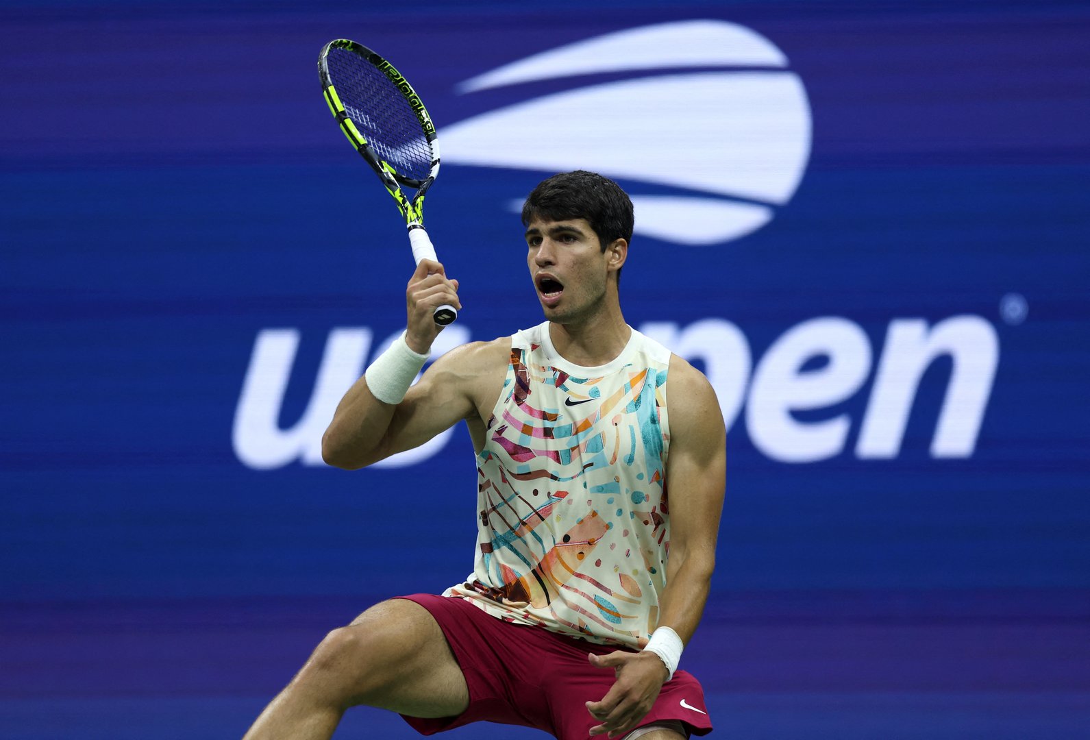 cover Alcaraz and Medvedev move on at U.S. Open as Isner exits with a bang