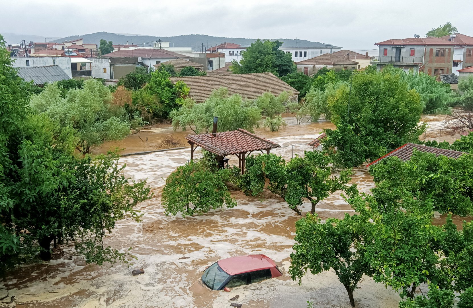 image Torrential rain follows summer wildfires in Greece, one dead
