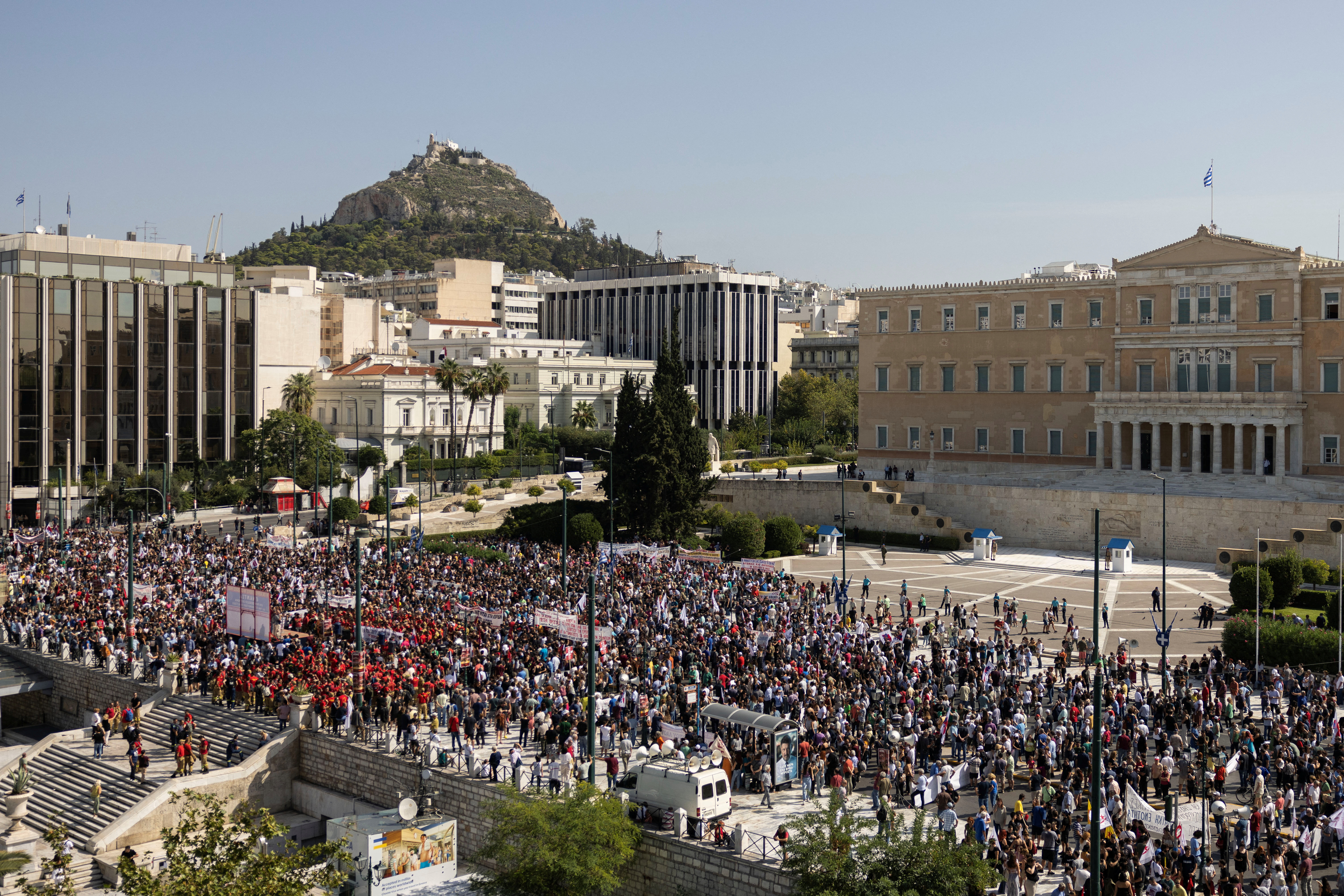 image Thousands of Greeks rally as state workers strike over labour law plans