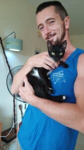 ryan hart with one of his beloved rescue cats