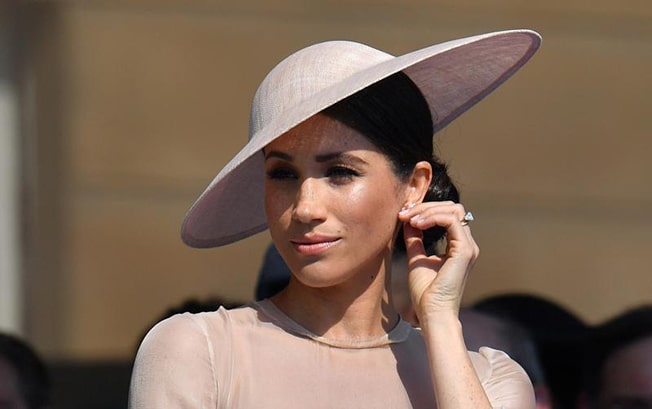 image UK police officers admit sending racist messages about Meghan, royals
