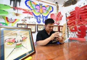 feature2 wei bowen makes a kite framework at his studio in north china's tianjin