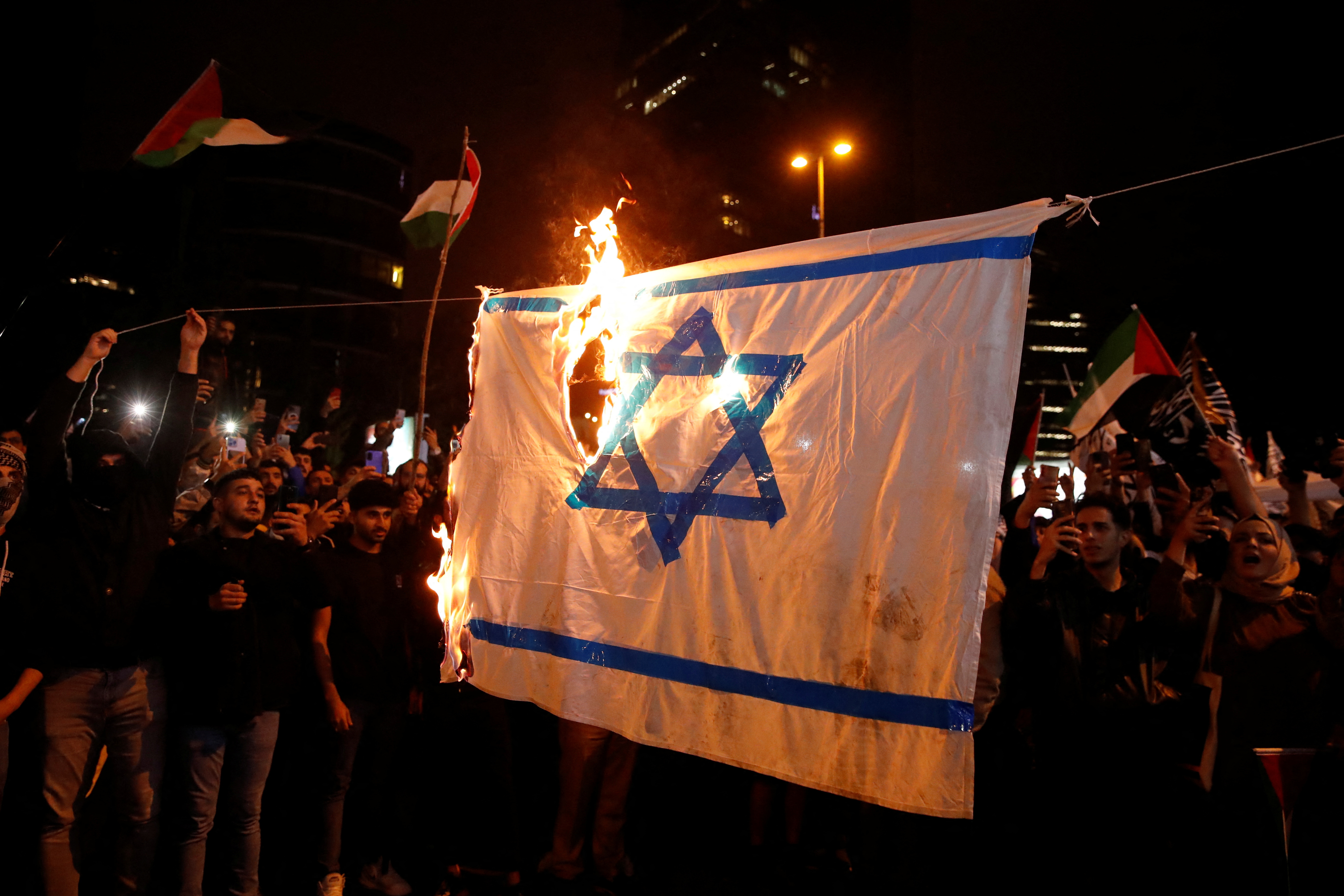 image Protesters in Mideast vent fury as Europe ups security