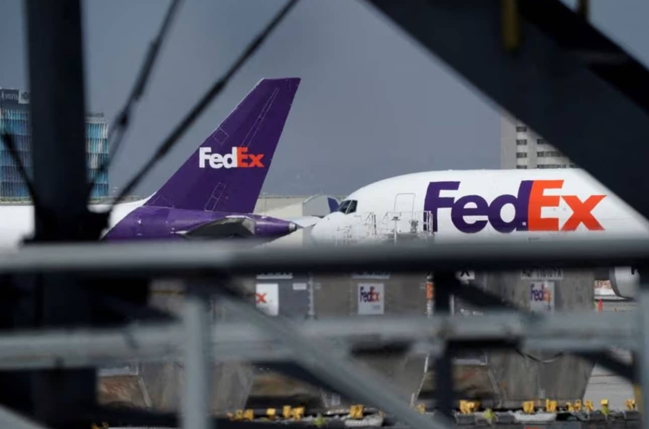 image In market share battle, FedEx and UPS target retail returns
