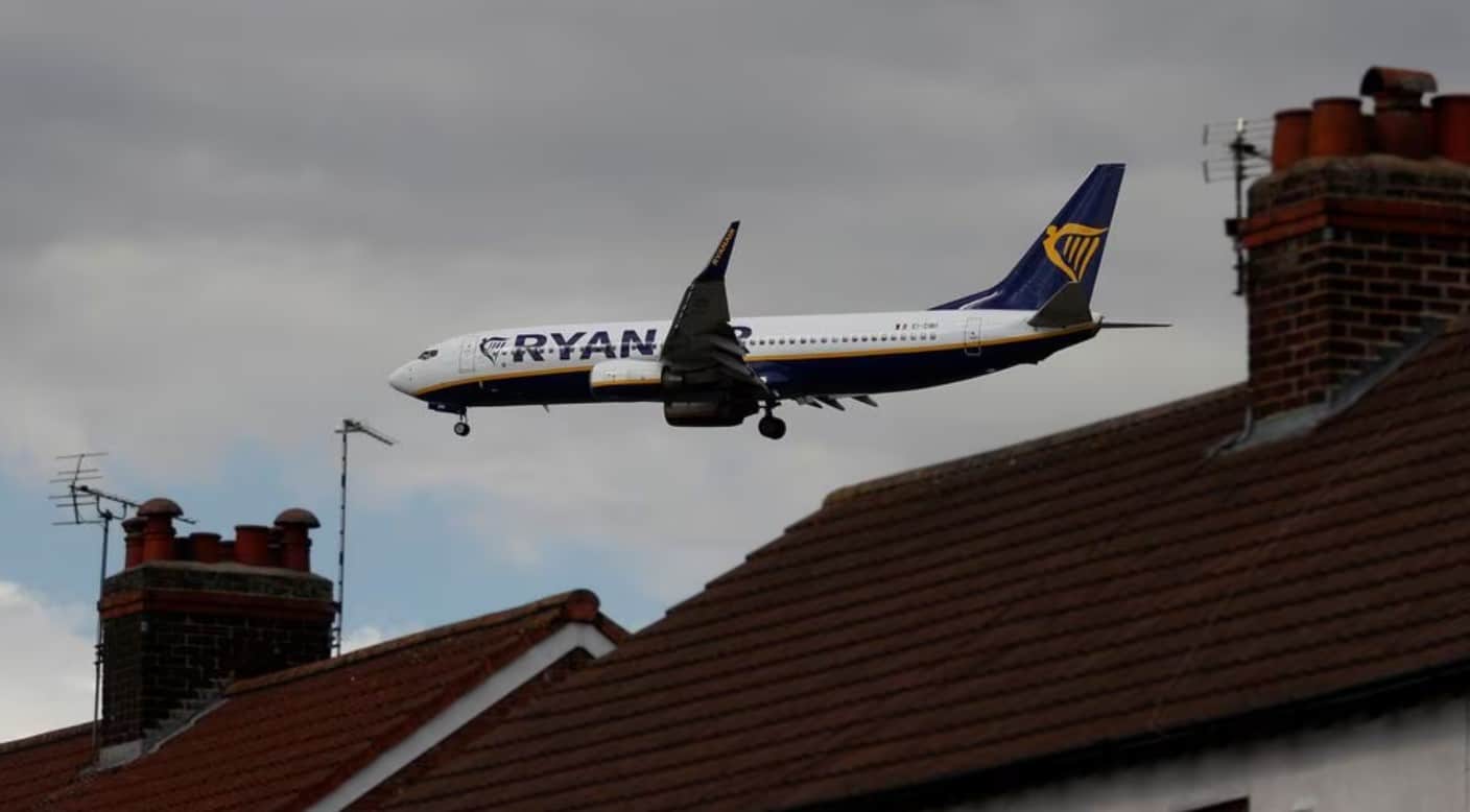 cover Ryanair sees record annual profit, first regular dividend as fares soar