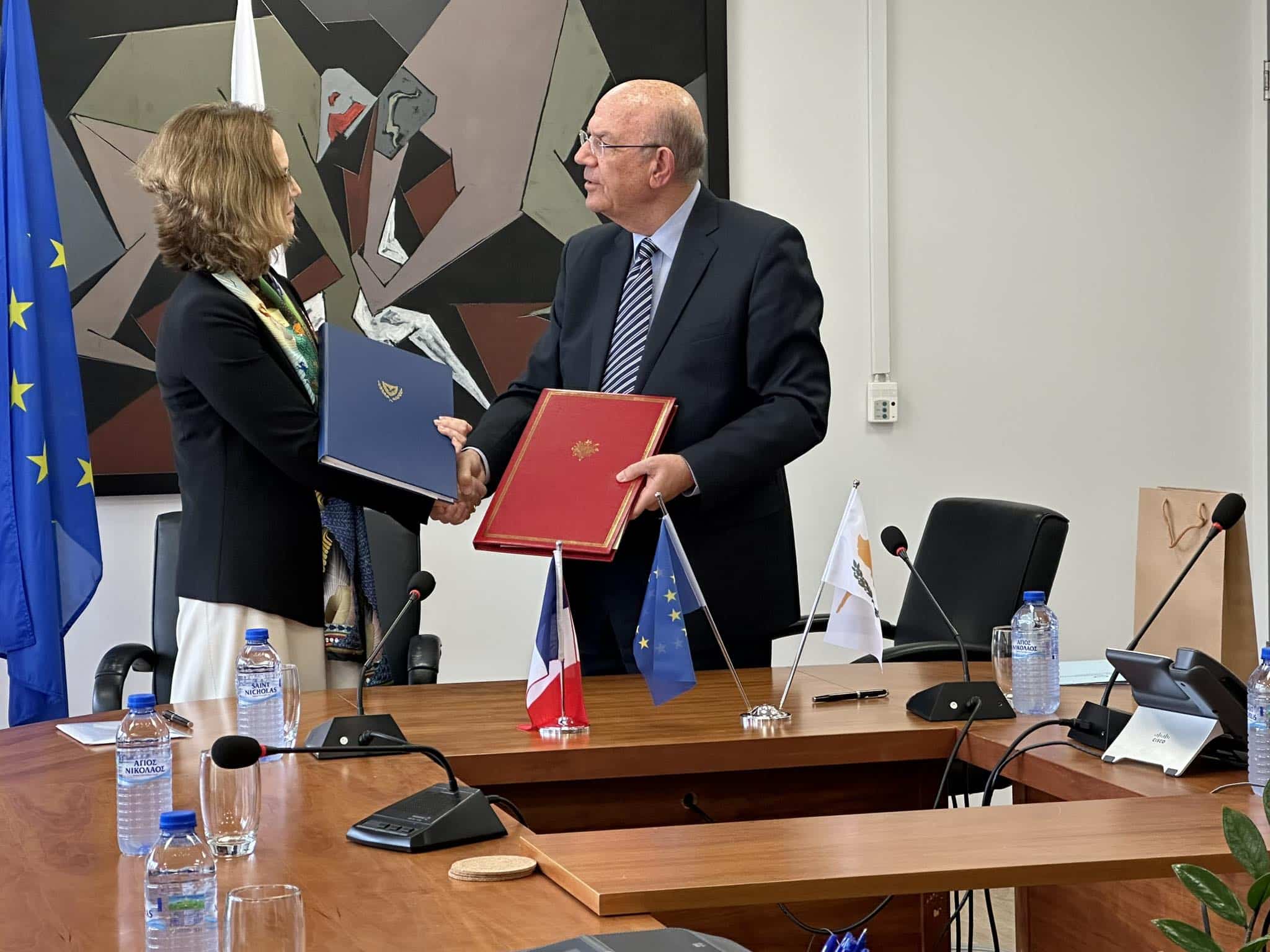 French ambassador Salina Grenet-Catalano and Finance Minister Makis Keravnos