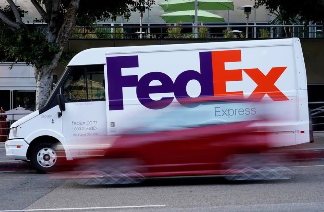 image FedEx profit misses, cuts full-year revenue forecast; shares sink