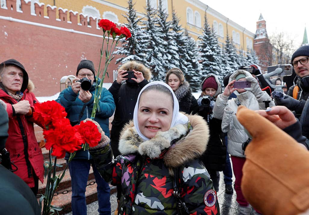 image At Putin campaign HQ, soldier&#8217;s wife says bring him home