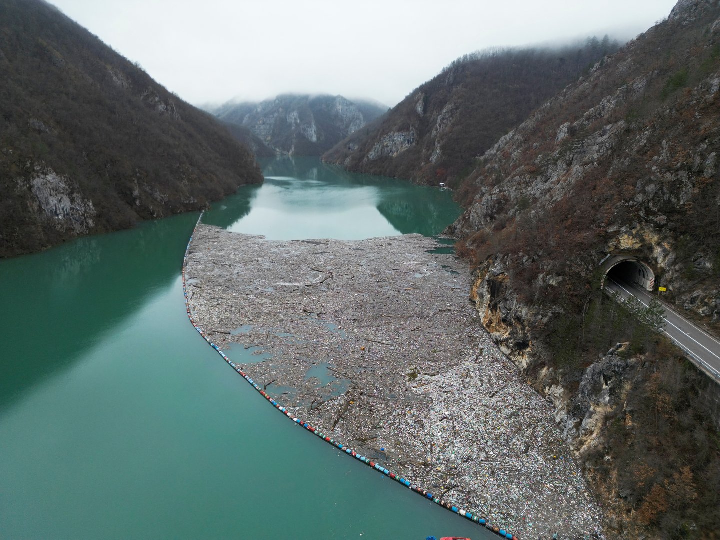 image Bosnian river&#8217;s floating waste dump threatens health, tourism