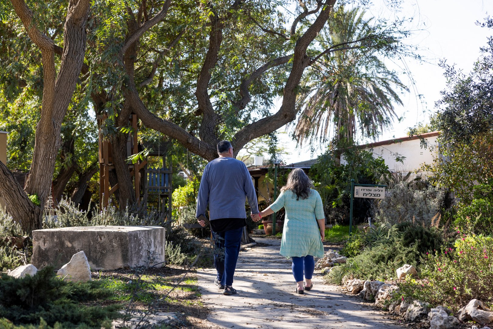 image Israeli couple returns to kibbutz ravaged by Hamas assault